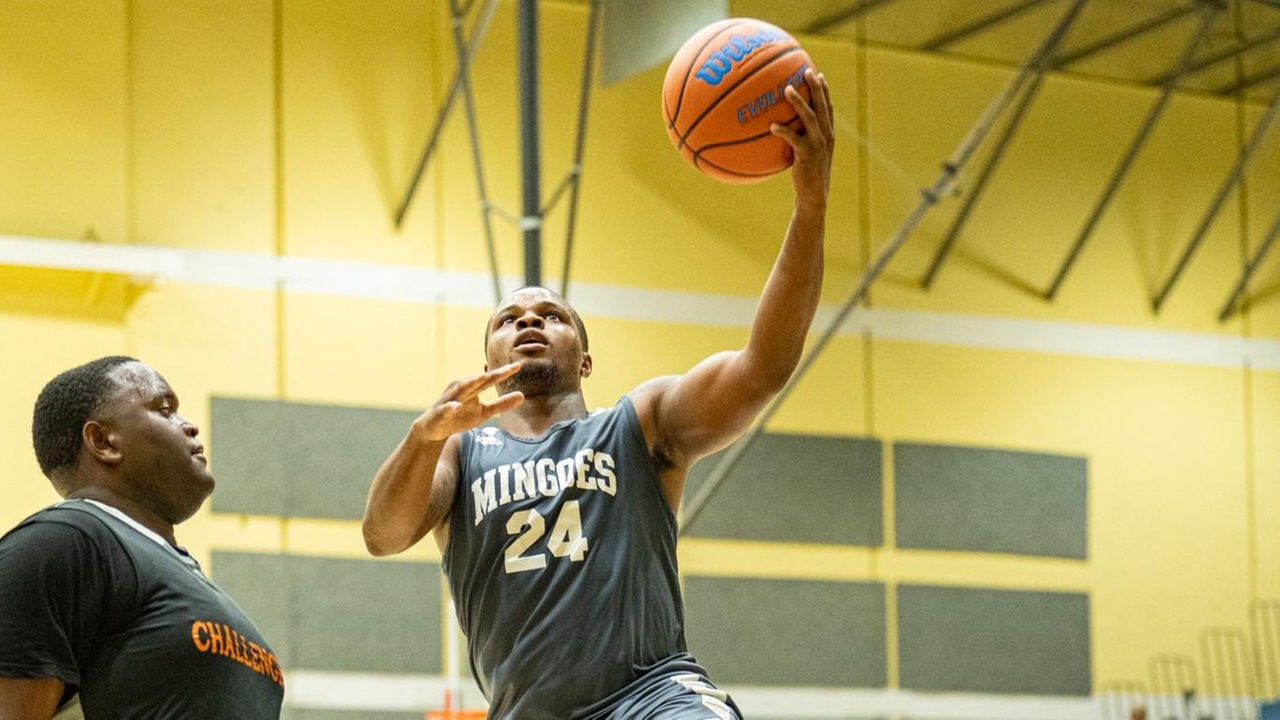 The University of The Bahamas Mingoes captain and guard lay the ball up during their 66-63 victory over the Bahamas Department of Correctional Services (BDOCS) Challengers in the UB Basketball Showcase Thursday, January 30 at the Kendal Isaacs Gymnasium. (UB ATHLETICS).