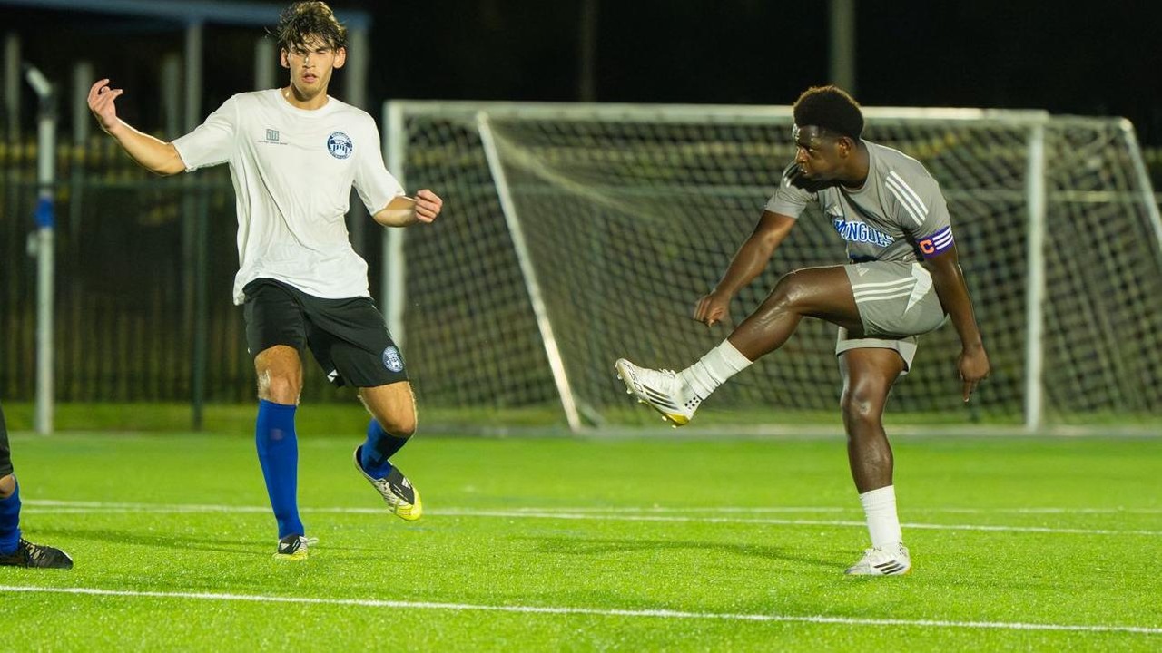 The University of The Bahamas captain and midfielder Ronaldo Green takes a shot during the match against Renegades FC in BMSL action at the Roscow A.L. Davies Soccer Fields Wednesday, October 29. UB won 2-1. UB ATHLETICS.