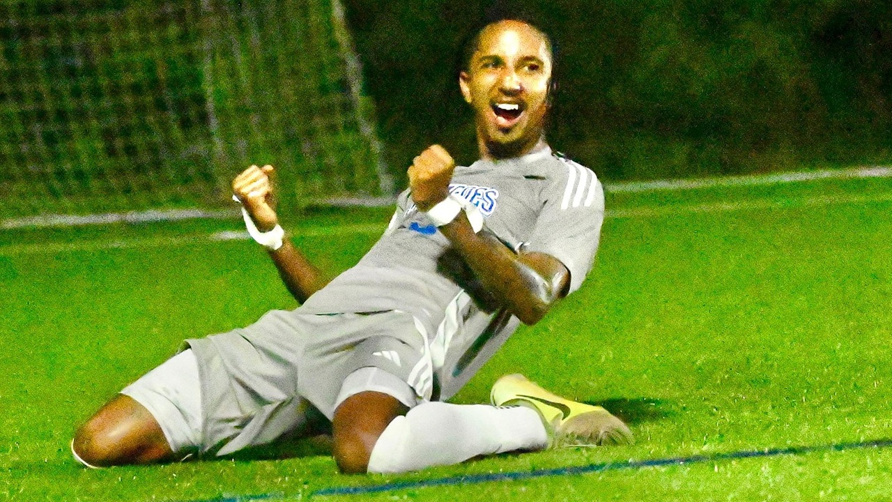 The University of The Bahamas forward Philip Pilgrim celebrates his goal in the first half of the match against Western Warriors in BMSL action at the Roscow A.L. Davies Soccer Fields Sunday, October 26. UB won 5-0. UB ATHLETICS.