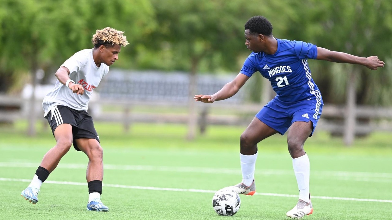 Mingoes forward Ronaldo challenges an Atlantis University defender on September 19. He finished with two goals as the Mingoes and Atlantis University finished the game in a 2-2 draw in Miami, Florida.