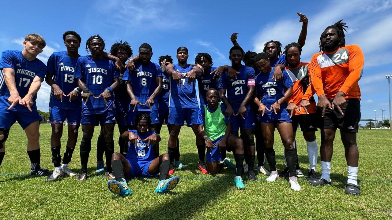 Mingoes men's soccer team celebrate their 9-2 victory over Millennia Atlantic University Macaws in Miramar Florida.