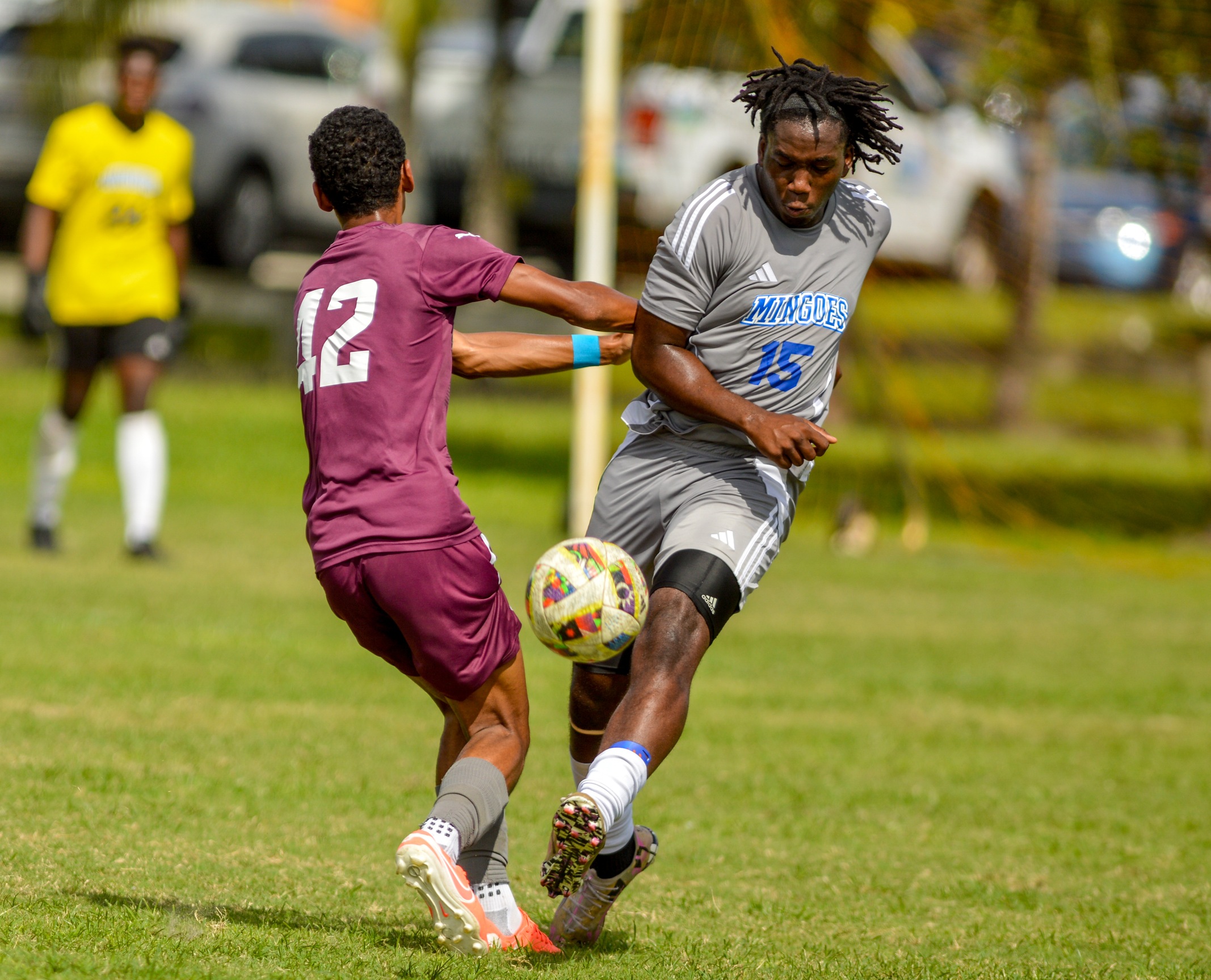 The University of The Bahamas Mingoes captain and defender Junior Kelly wins the ball during his match against United International College at the Amelia Soccer Park in Hialeah, Florida on Saturday. UB Athletics.