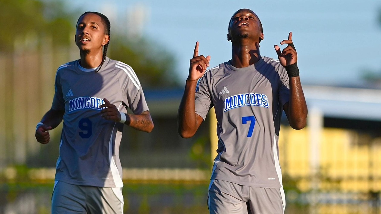 The University of The Bahamas forwards Philip Pilgrim (Gray 9) and Nahum Johnson (Gray 7) celebrates Johnson's goal against Inter Nassau F.C. on Sunday, November 30 at the Roscow A.L. Davies Soccer Fields. UB won 5-1. UB Athletics.