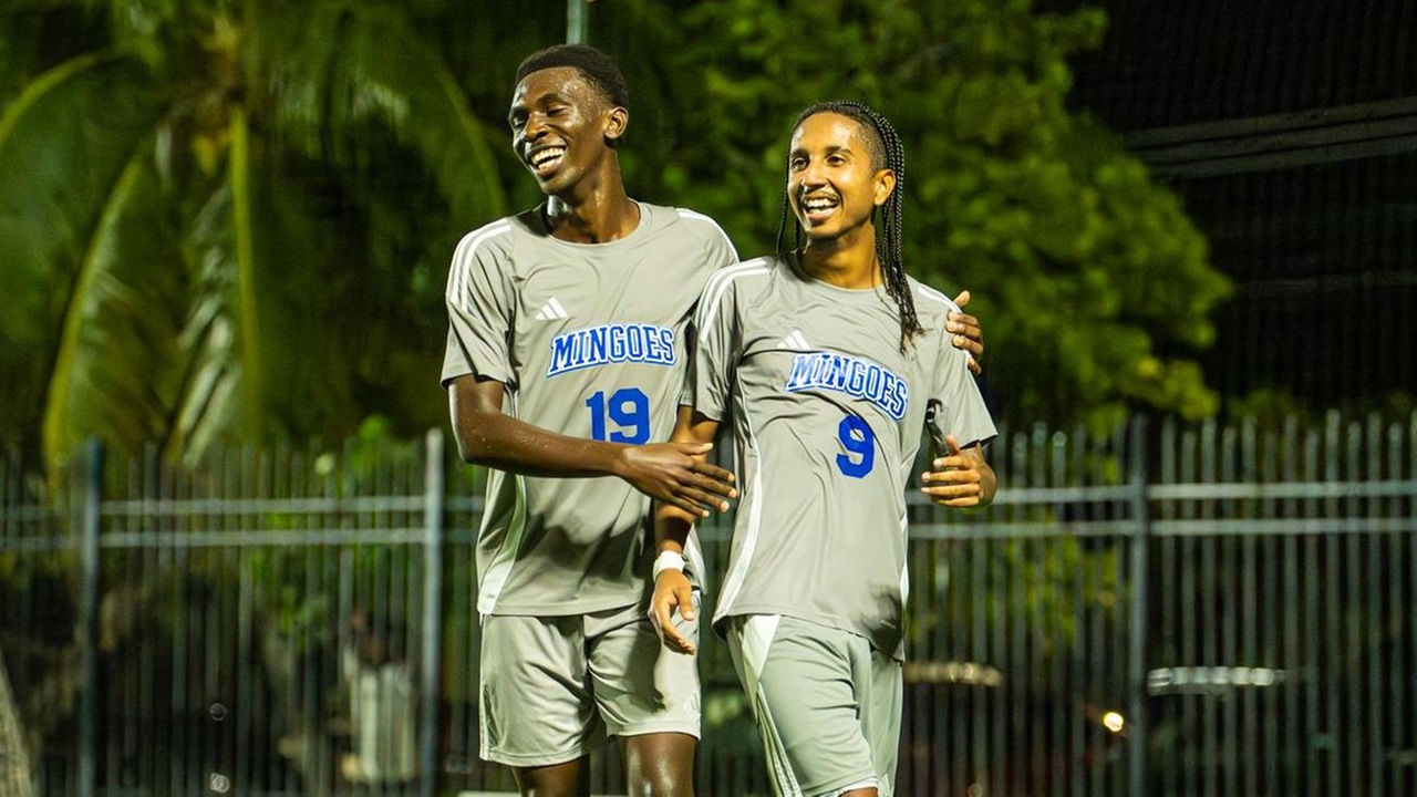 The University of The Bahamas winger Keno Thomas (left) celebrates Philip Pilgrim's goal against the Western Warriors in the Bahamas Men's Soccer League opener Sunday at the Roscoe A.L. Davies Soccer Fields. UB won 5-0. UB Athletics.