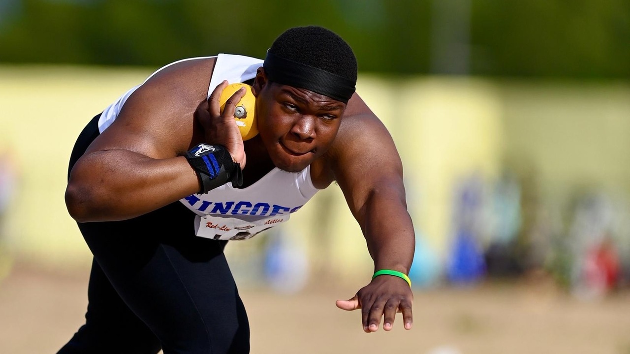 Newcomer Corbin Wins Shot Put