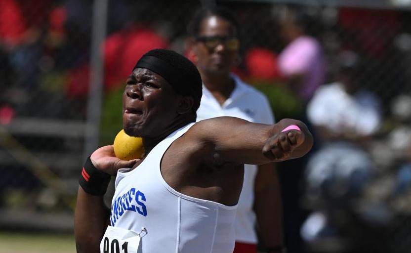 Corbin wins shot put again