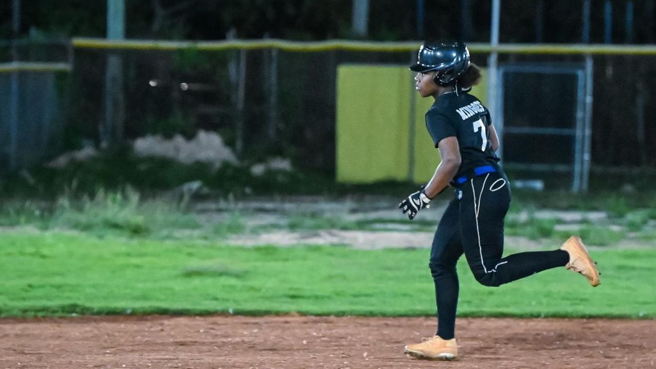 The University of The Bahamas Mingoes leftfielder Aaliyah Wilmott runs the base during the Mingoes matchup against the Sunshine Auto Wildcats at Bankers' Field. The Mingoes fell 9-1.
