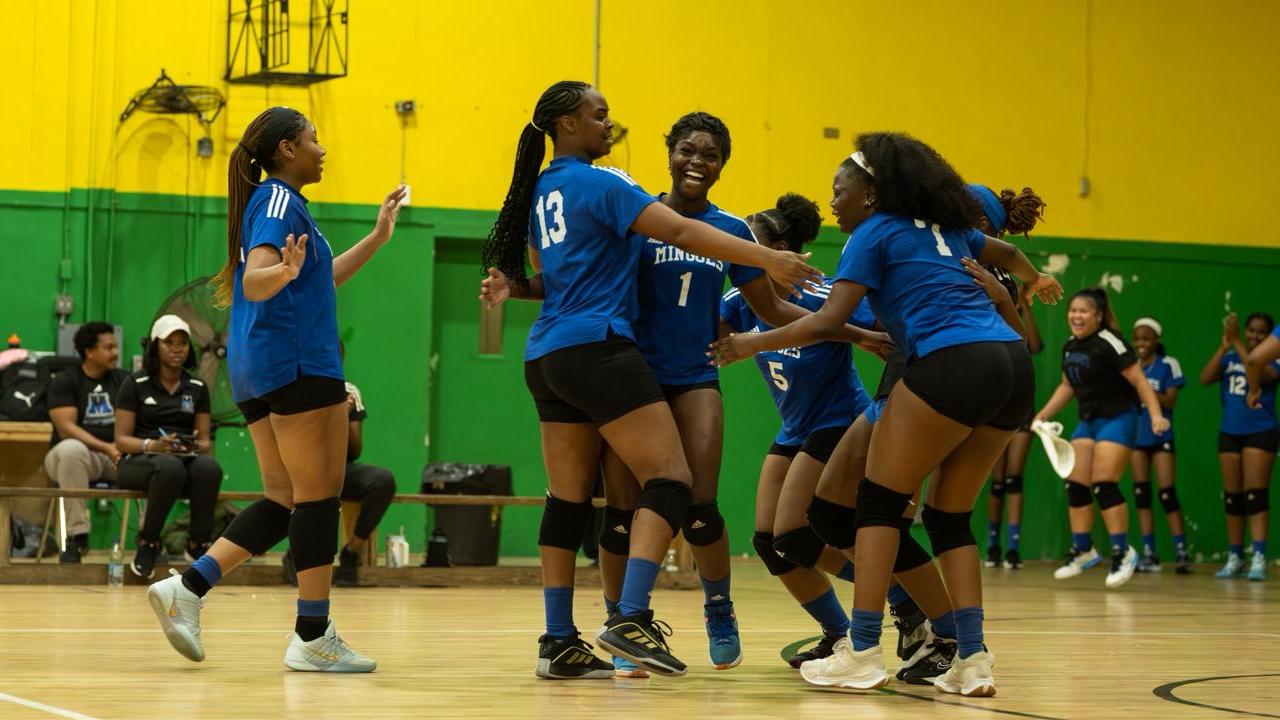 The University of The Bahamas Mingoes volleyball celebrates a point against Ballers on Monday, January 26 at the D.W. Davis Gymnasium. UB lost 3-2. UB Athletics.
